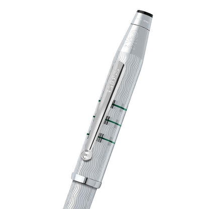 Silver pen with intricate design on a white background